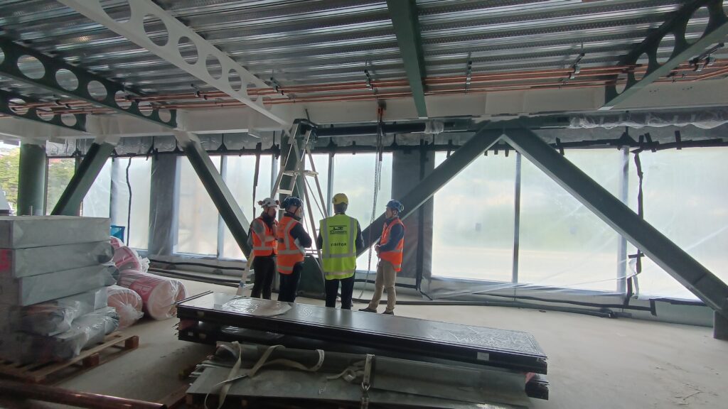 Construction site of 44 Bowen St showing dampers being installed
